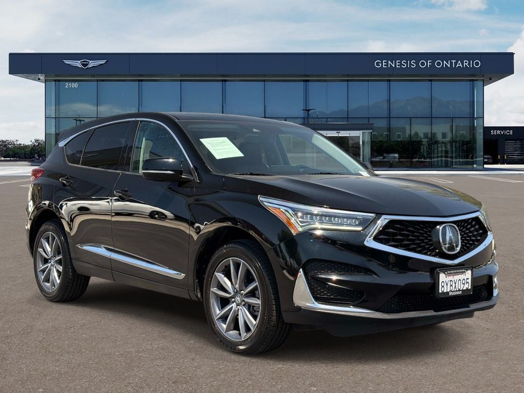 2021 Acura RDX Technology Package in Majestic Black Pearl — front three-quarter view