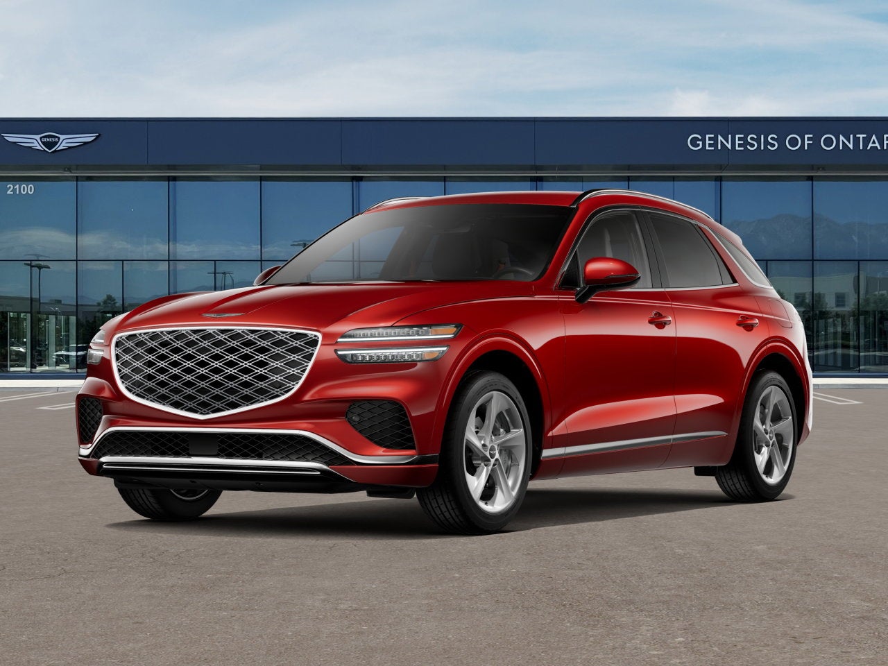 2026 Genesis GV70 2.5T in Mauna Red — front three-quarter view