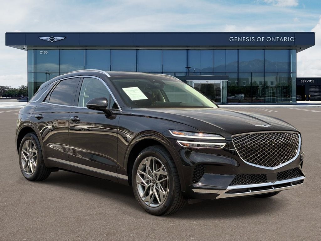 2024 Genesis GV70 2.5T Advanced in Vik Black — front three-quarter view