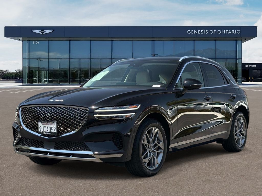 2024 Genesis GV70 — rear three-quarter view