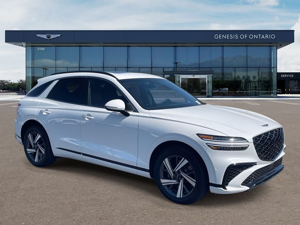 2026 Genesis GV70 3.5T SPORT ADVANCED in Uyuni White — front three-quarter view