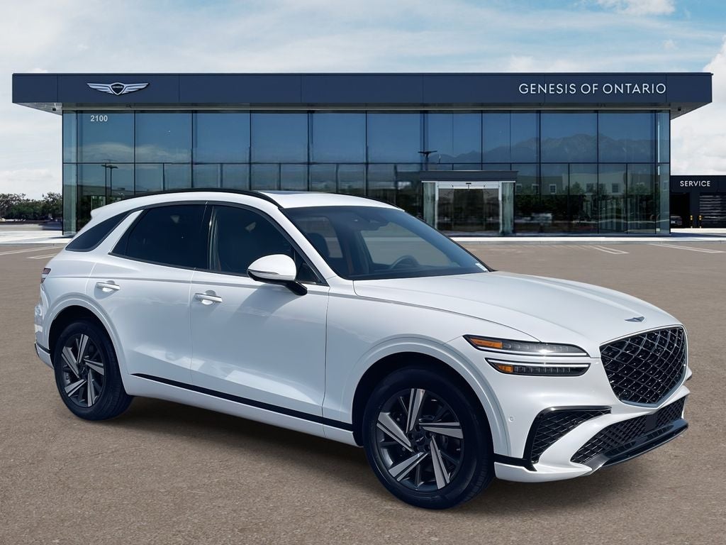2026 Genesis GV70 3.5T SPORT ADVANCED in Uyuni White — front three-quarter view