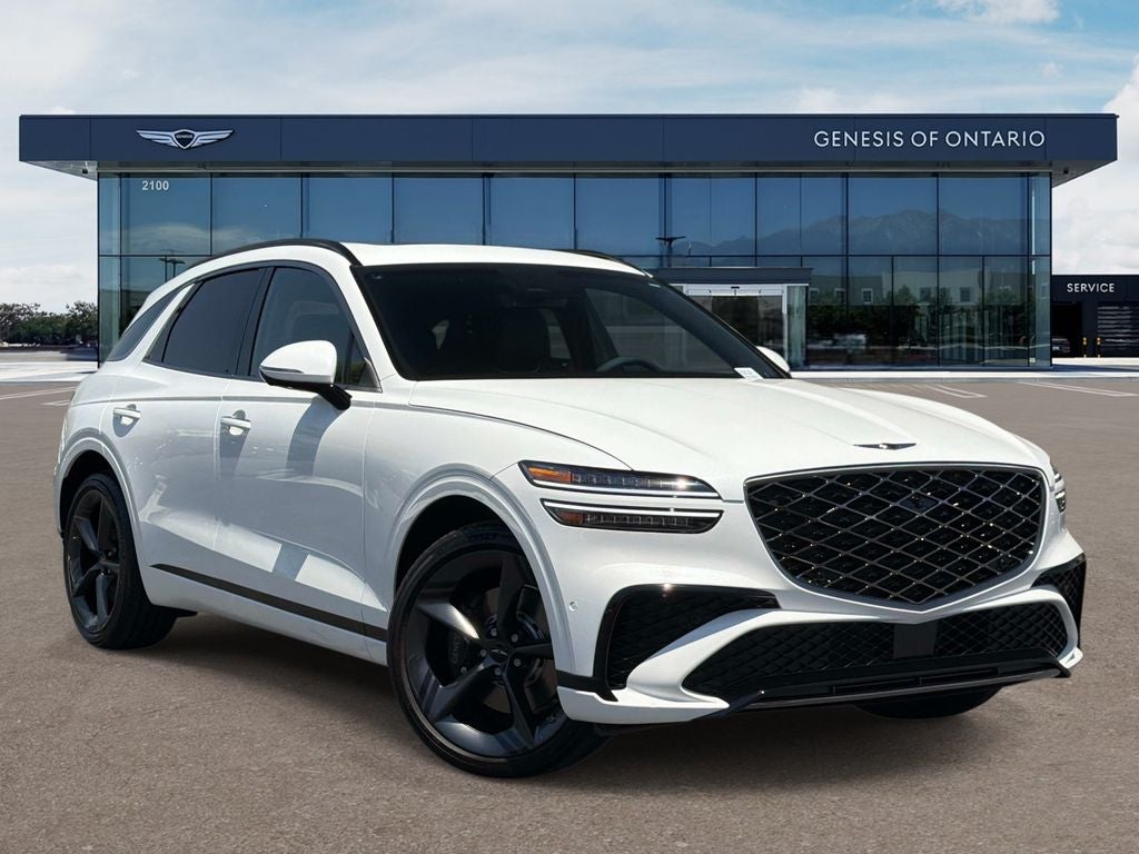 2026 Genesis GV70 2.5T SPORT PRESTIGE in Uyuni White — front three-quarter view