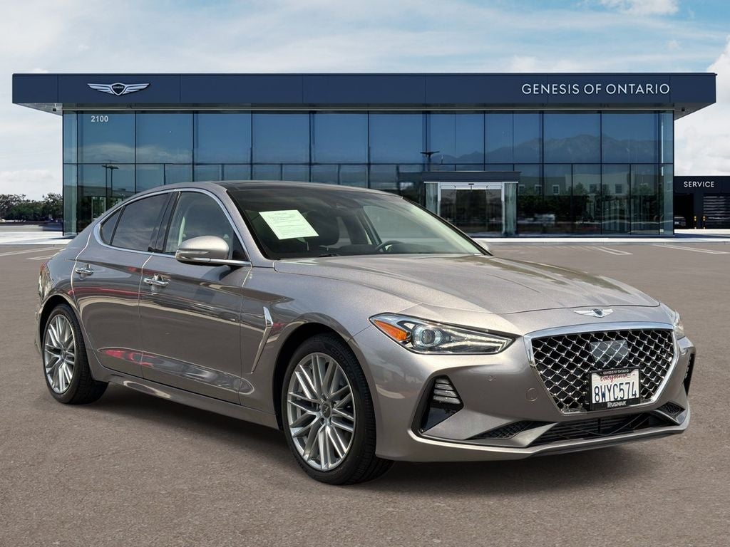 2021 Genesis G70 2.0T Elite in Savile Silver — front three-quarter view