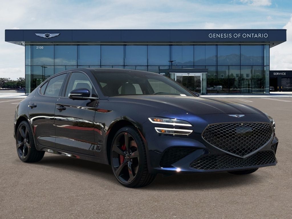 2026 Genesis G70 3.3T SPORT PRESTIGE in Capri Blue — front three-quarter view