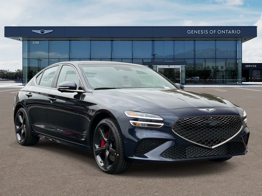 2026 Genesis G70 3.3T SPORT PRESTIGE in Capri Blue — front three-quarter view