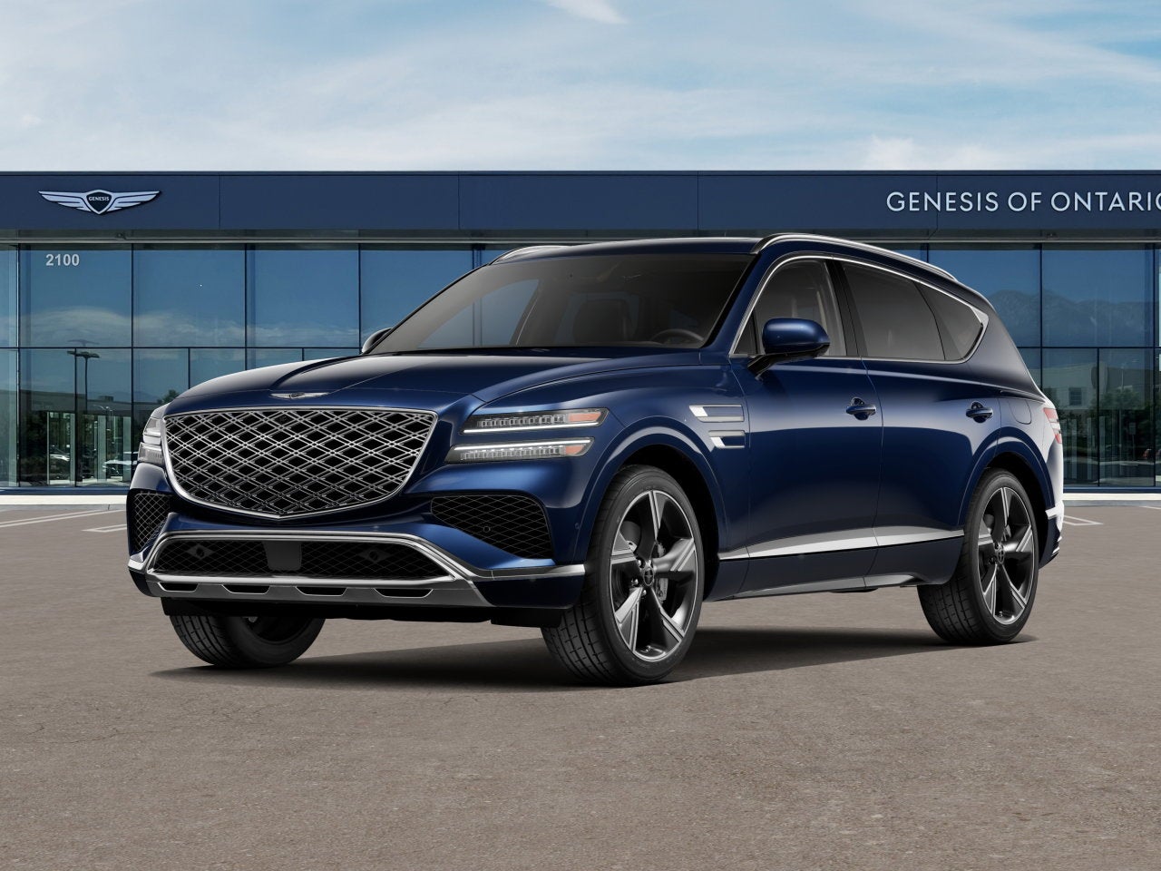2026 Genesis GV80 2.5T PRESTIGE in Capri Blue — front three-quarter view