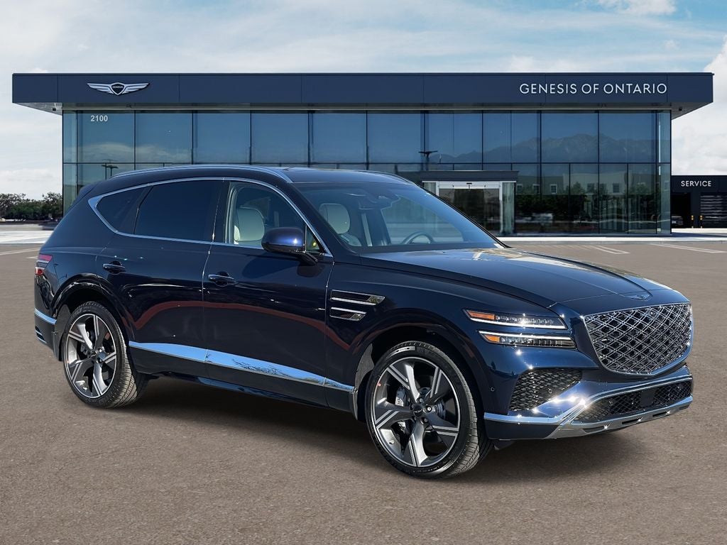 2026 Genesis GV80 3.5T PRESTIGE in Capri Blue — front three-quarter view