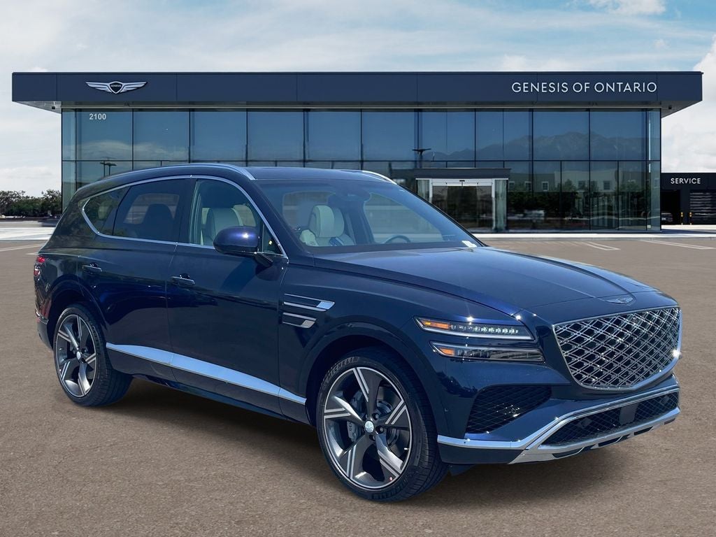 2026 Genesis GV80 3.5T PRESTIGE in Capri Blue — front three-quarter view