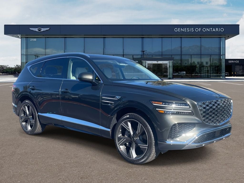 2026 Genesis GV80 3.5T PRESTIGE in Storr Green — front three-quarter view