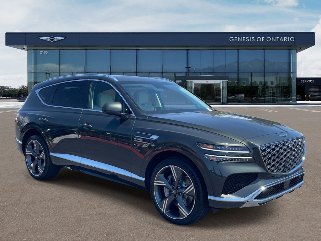 2026 Genesis GV80 3.5T PRESTIGE in Storr Green — front three-quarter view