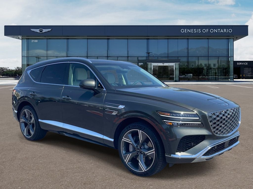 2026 Genesis GV80 3.5T PRESTIGE in Storr Green — front three-quarter view