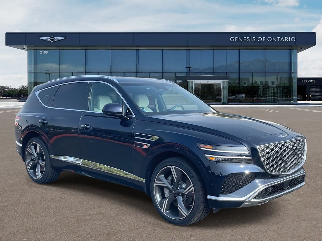 2026 Genesis GV80 3.5T PRESTIGE in Capri Blue — front three-quarter view