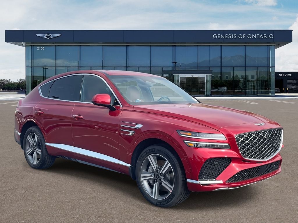 2026 Genesis GV80 Coupe 3.5T in Mauna Red — front three-quarter view