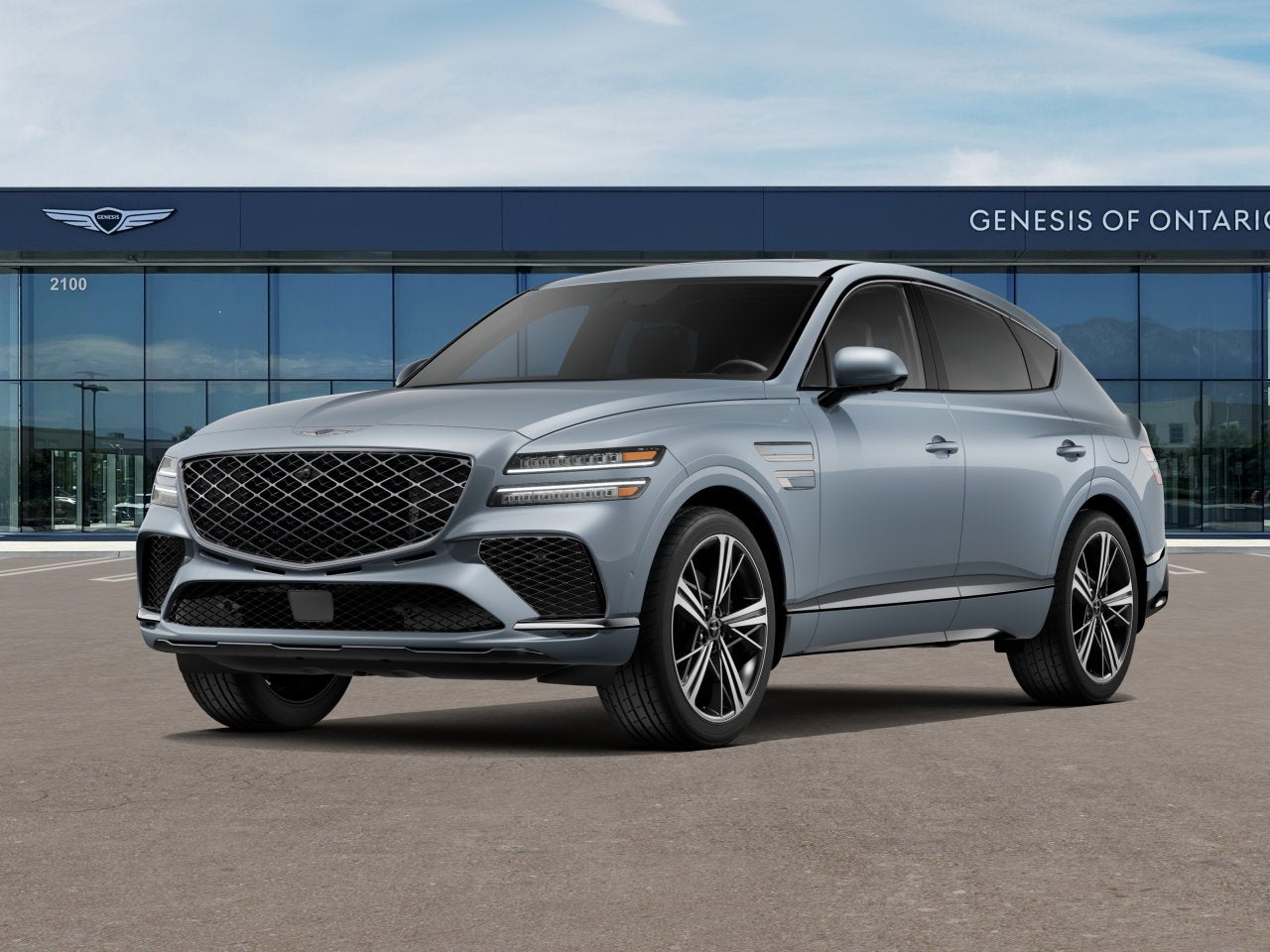 2026 Genesis GV80 Coupe 3.5T E-SC MHEV in Bering Blue — front three-quarter view