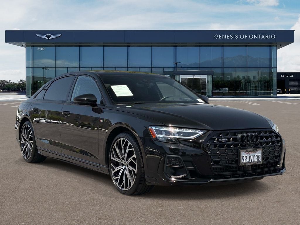 2024 Audi A8 L 55 quattro in Mythos Black Metallic — front three-quarter view